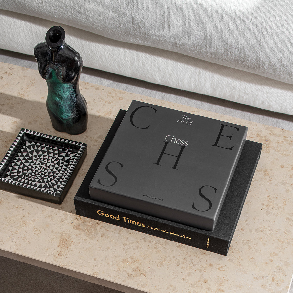 black chess piece sitting on table