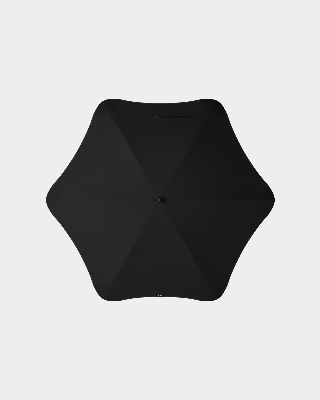 Black sport umbrella with hexagonal canopy and ergonomic handle designed for performance and protection in various weather conditions