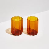 Set of two amber wave glasses with rippled design for stylish beverage serving