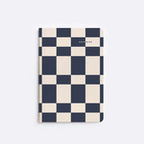 Checkers A5 softcover notebook with bold black and cream checkerboard design, portable and ideal for work or school use.