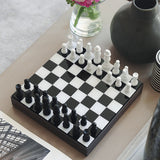 black chess set sitting on table
