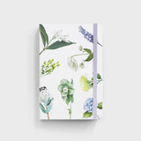Botanical hardcover notebook with elastic band and floral design on white cover