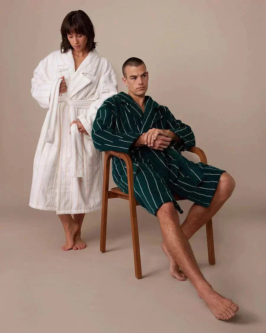 people sitting with bath robe on
