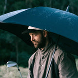 man holding umbrella