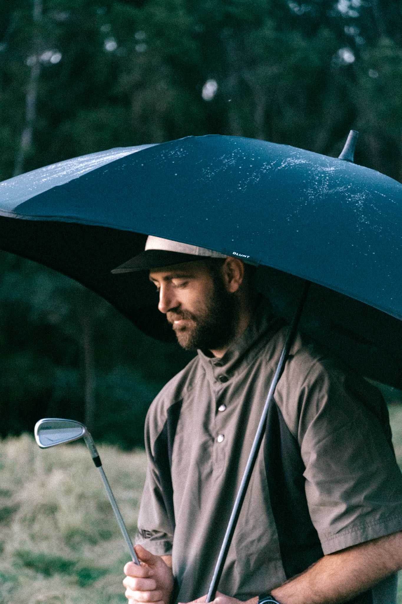 man holding umbrella