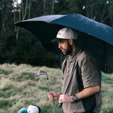 man holding umbrella
