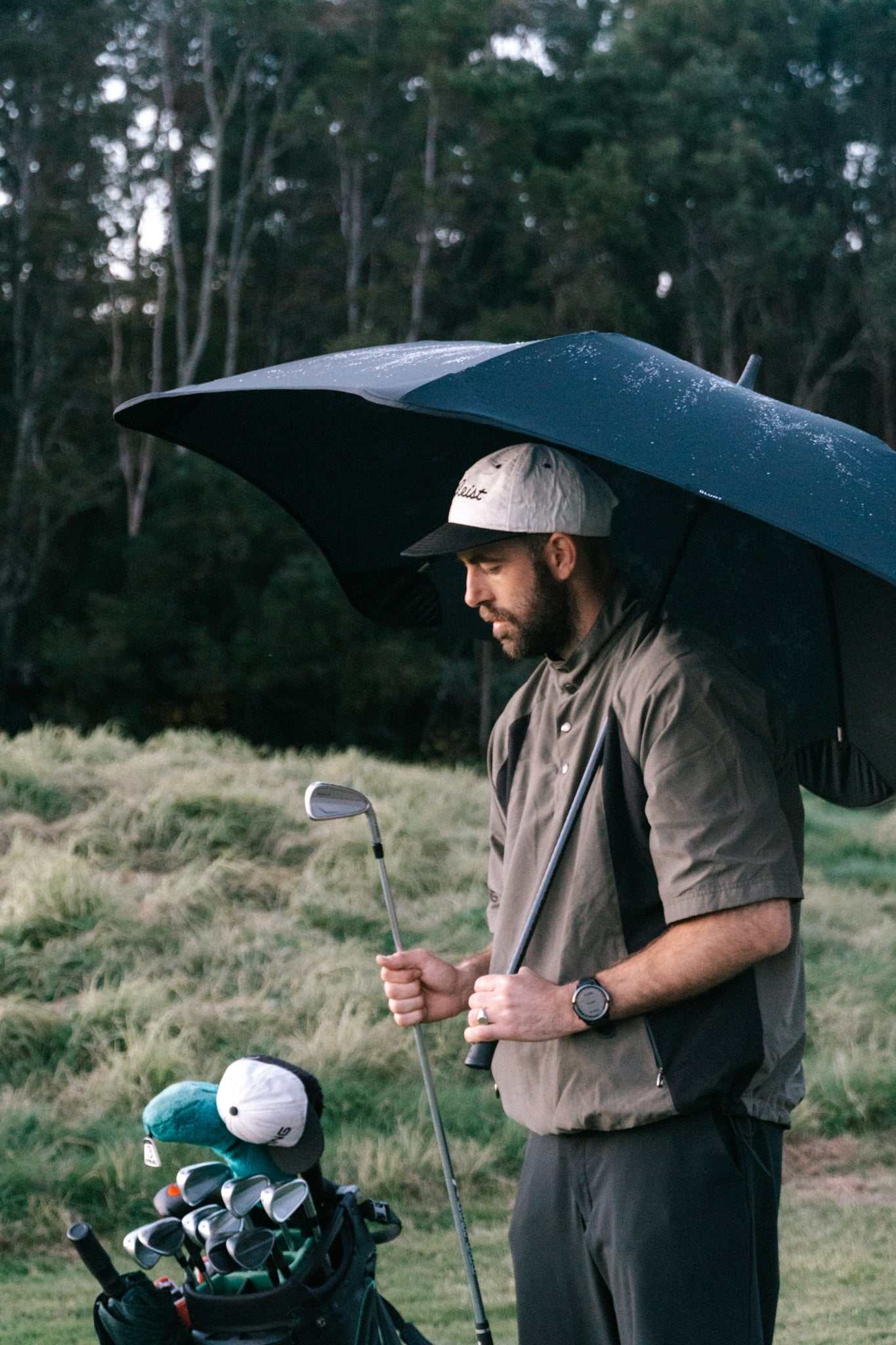 man holding umbrella