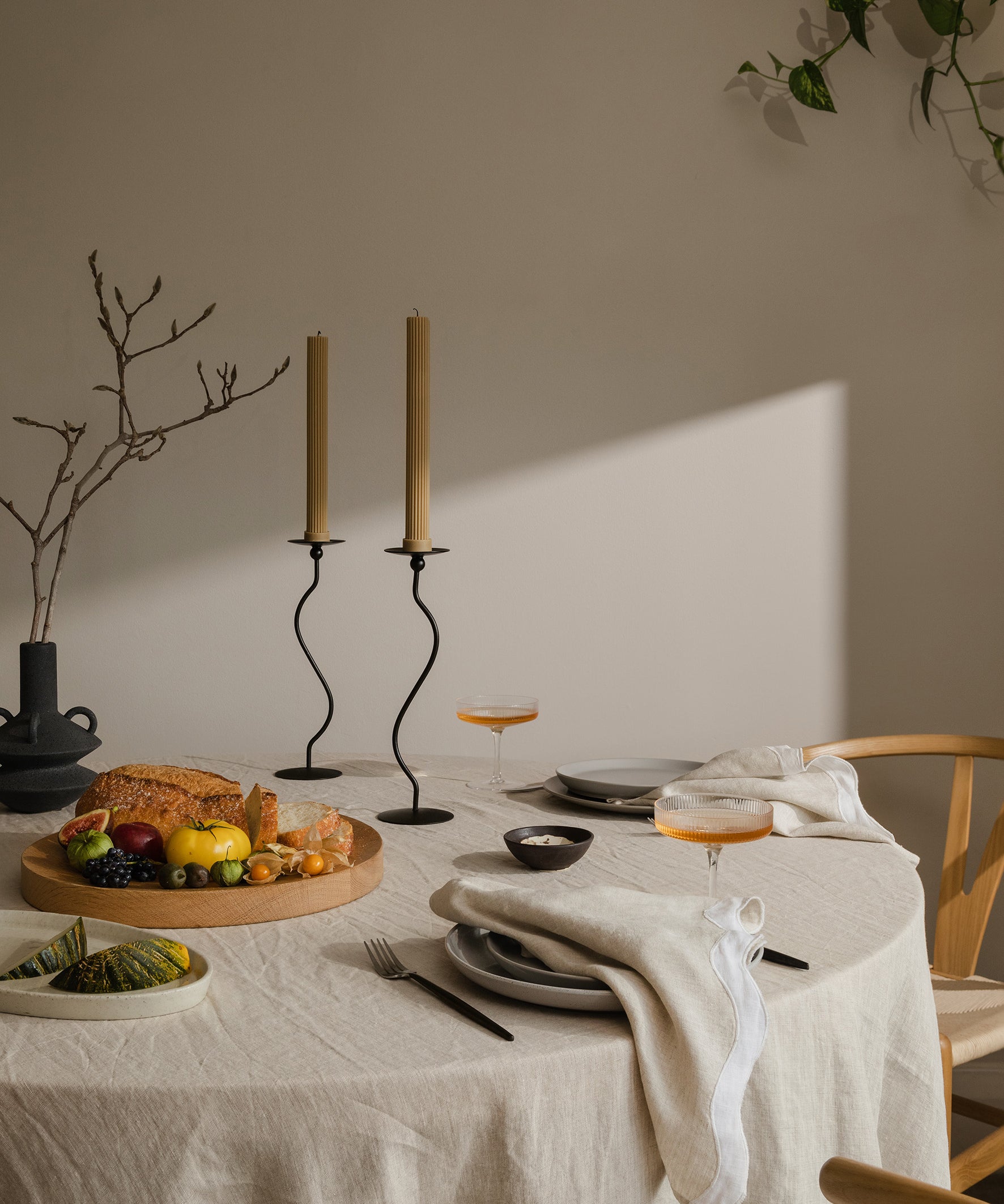 set table with food and napkins with sun shining through