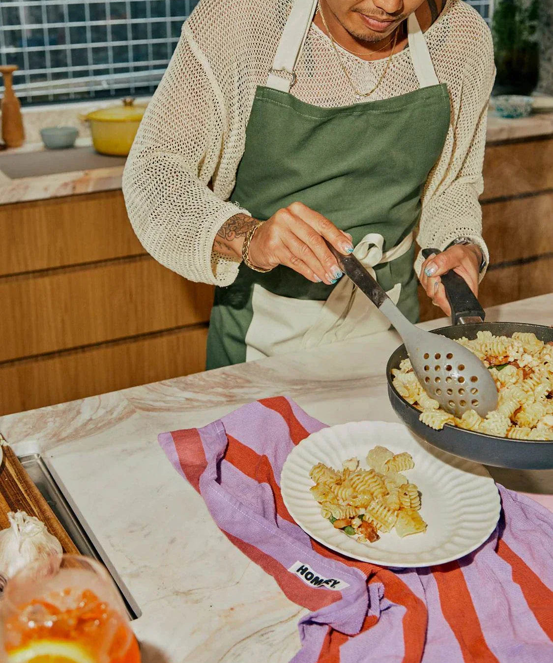 tea towel in kitchen as someone cooks