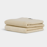 Soft beige hand towel folded neatly for a spa-like home experience Hand Towel - Coconut
