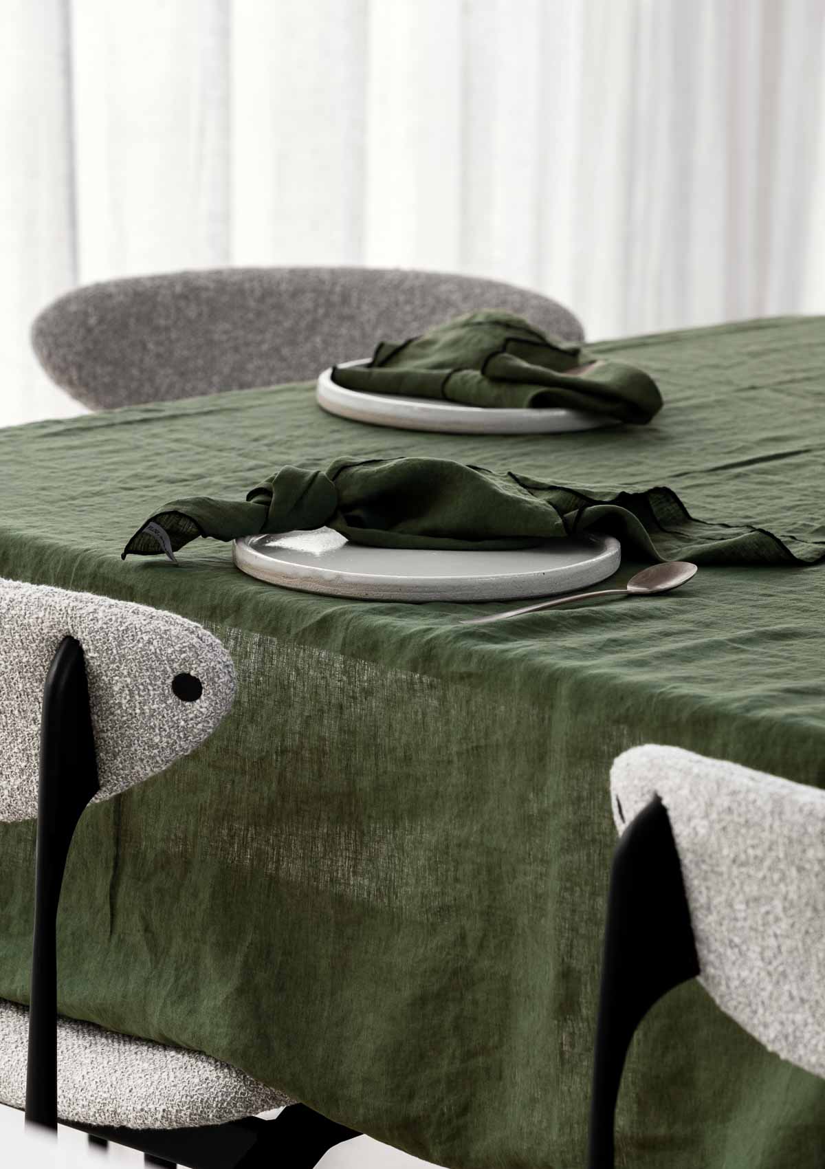 forest green tablecloth with forest green napkins on it