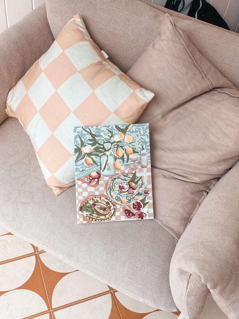 kit sitting on couch