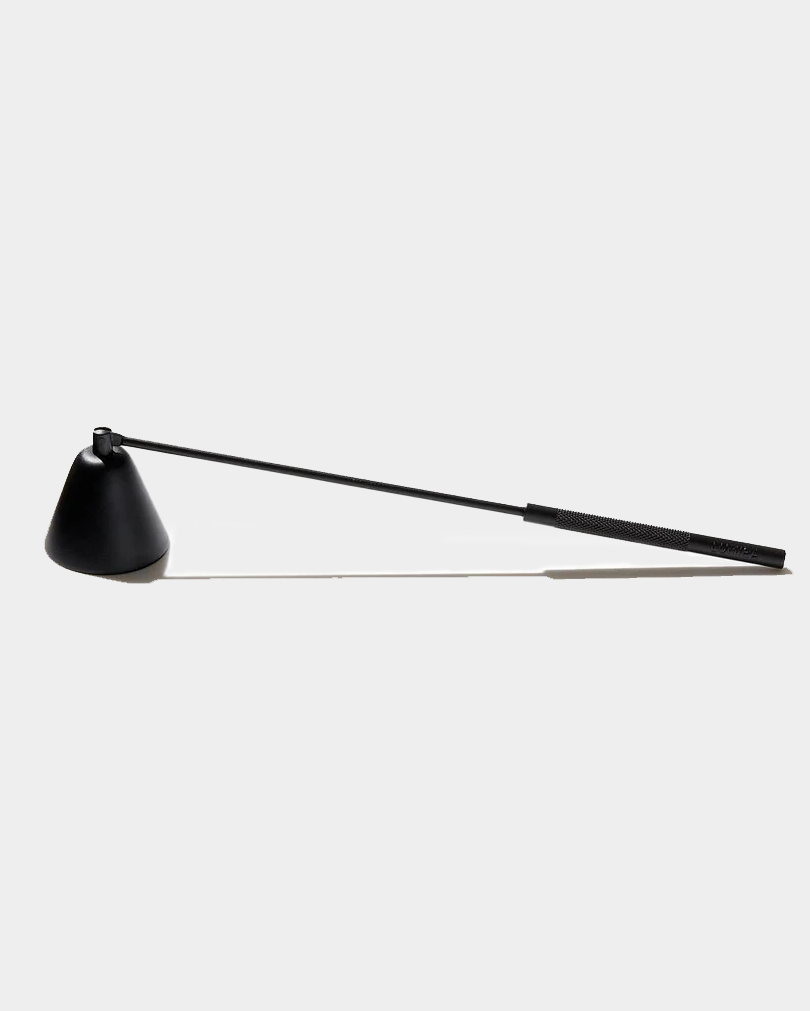 Black metal candle snuffer with long handle for safely extinguishing candle flames.