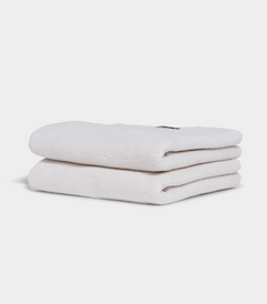 Soft white hand towel neatly folded for a spa-like home experience