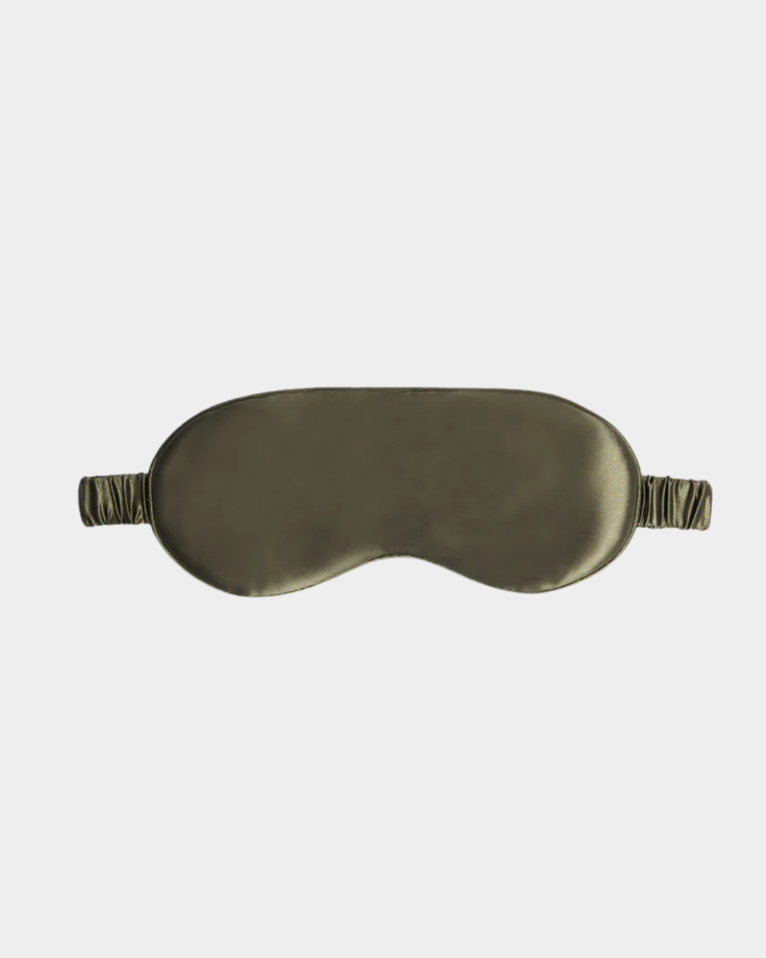 Silk Eyemask in sage green with elasticated strap and cushioned interior for comfortable blackout sleep