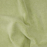 up close picture of texture of green towel