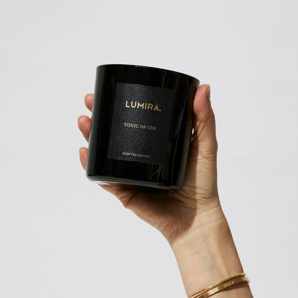 woman holding up candle