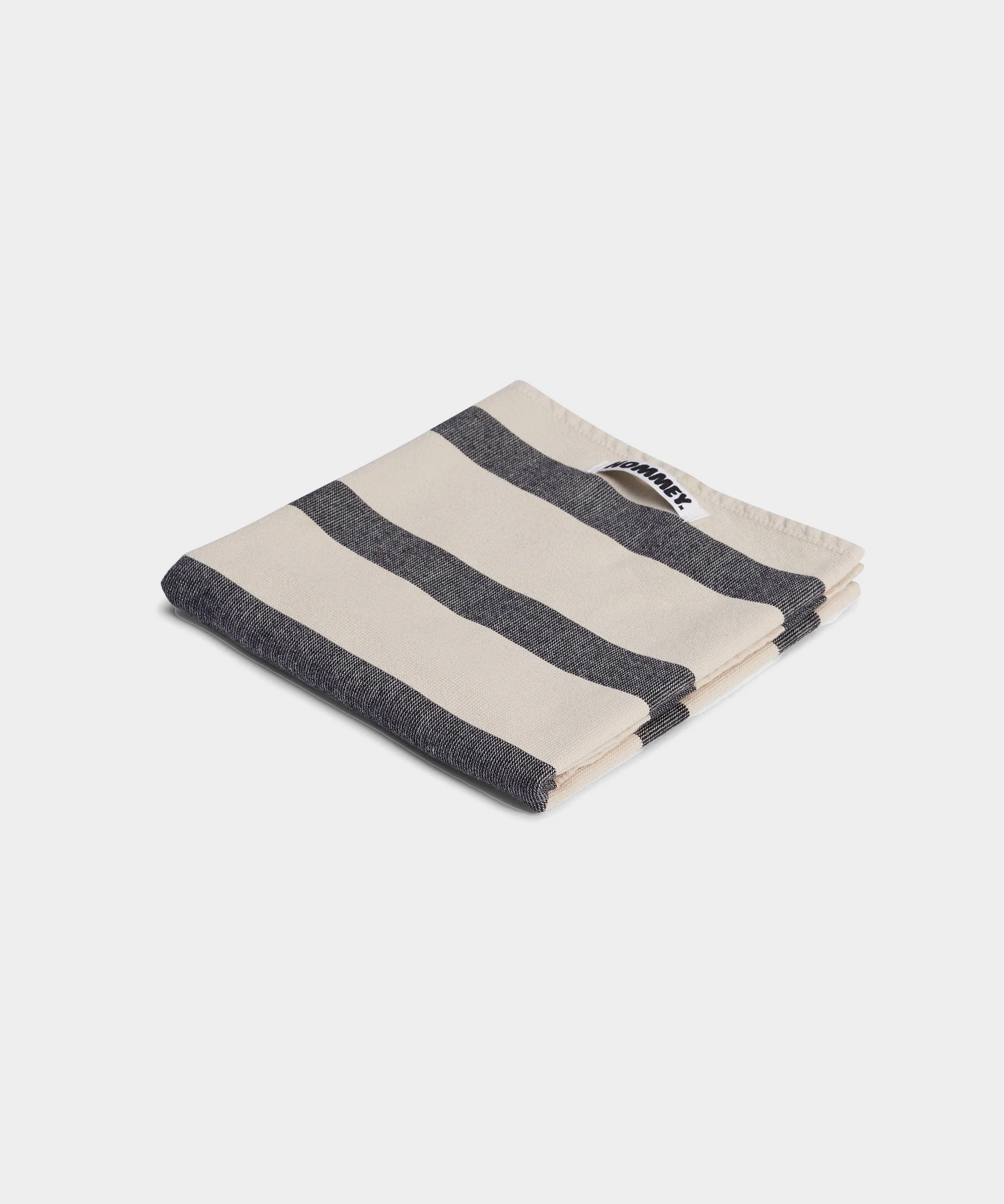 Folded tea towel with vanilla bean striped pattern made of 100% cotton for kitchen use