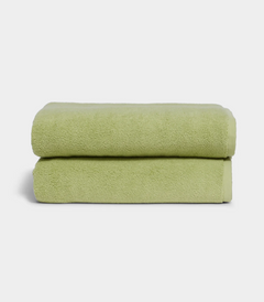 Soft wasabi green bath towel set folded for a spa-like home experience