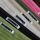 different coloured of bath mats sitting together
