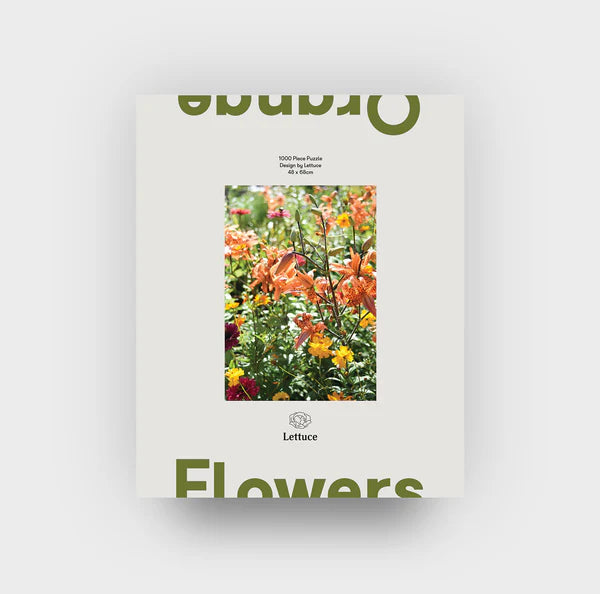 puzzle set of orange flowers sitting on white background