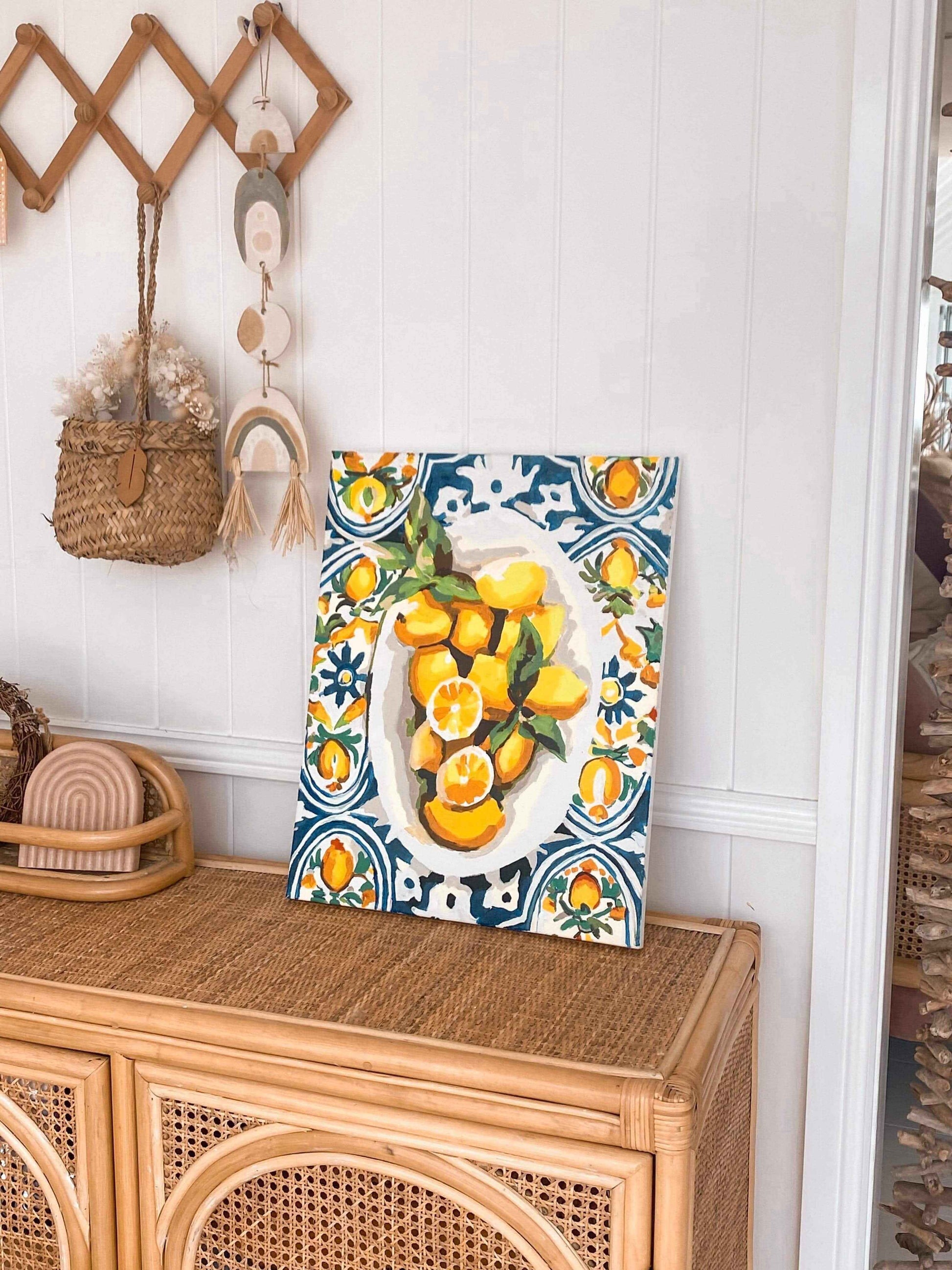 art of a lemon bowl sitting on a console table