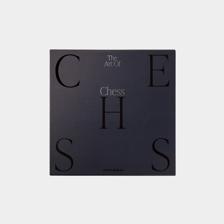 black packaging box of chess set on white background