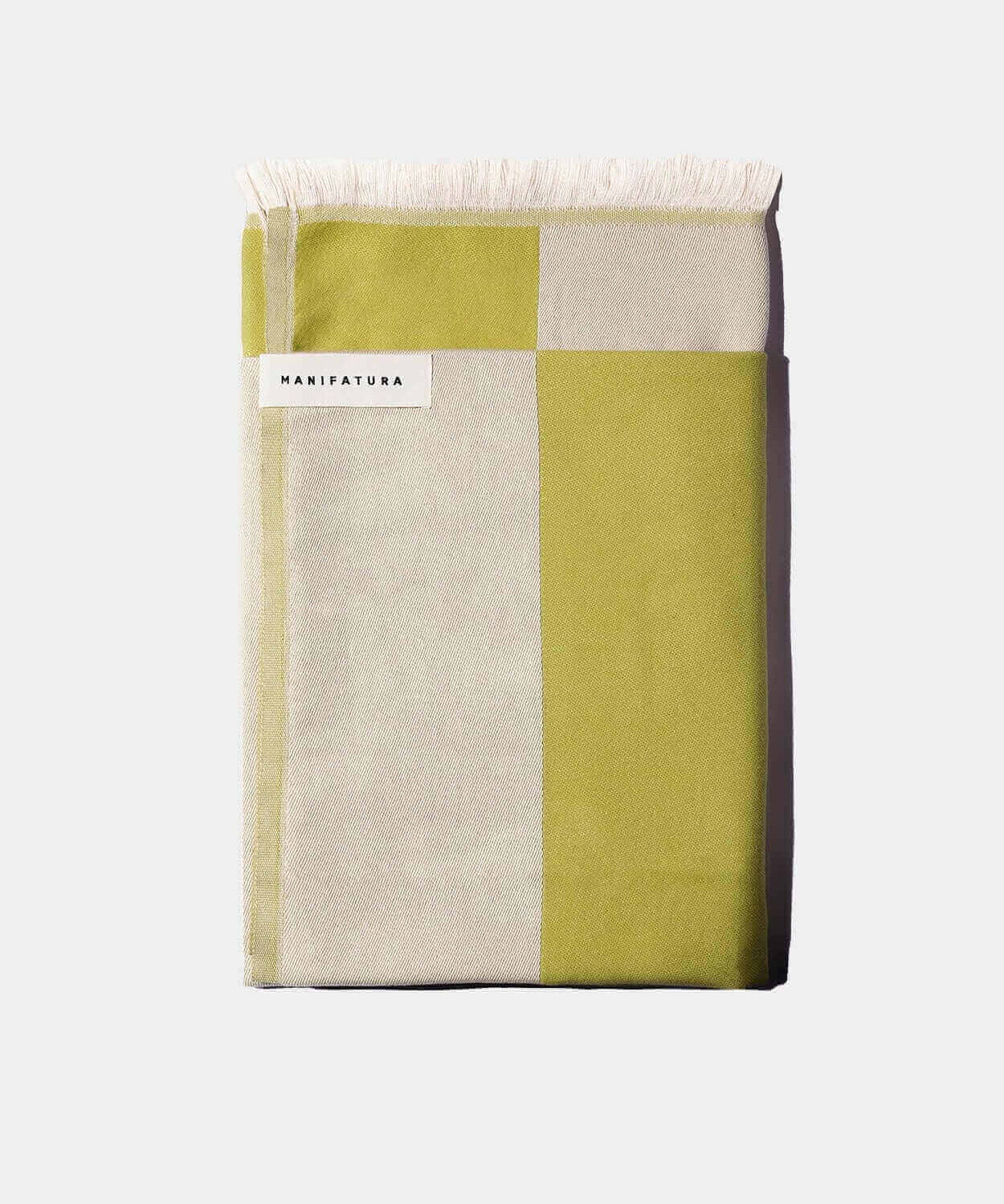 pistachio green and white folded green towel