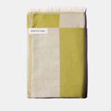 pistachio green and white folded green towel