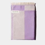 lavender beach towel folded up