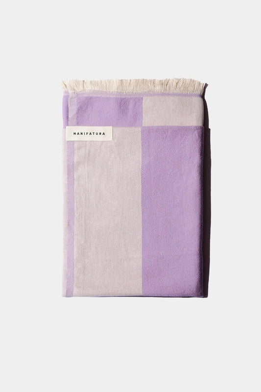 lavender beach towel folded up