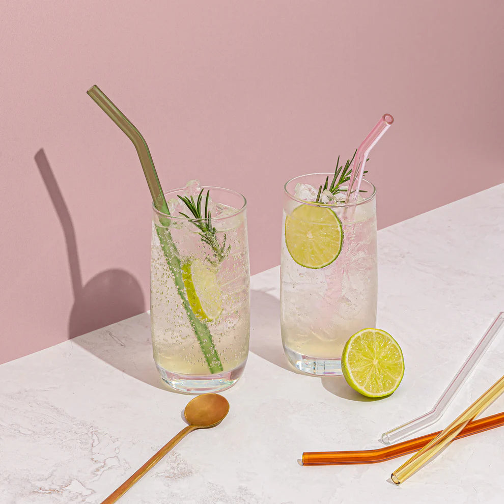 lifestyle shot of smoothies and straws on table