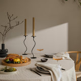 set table with food and napkins with sun shining through