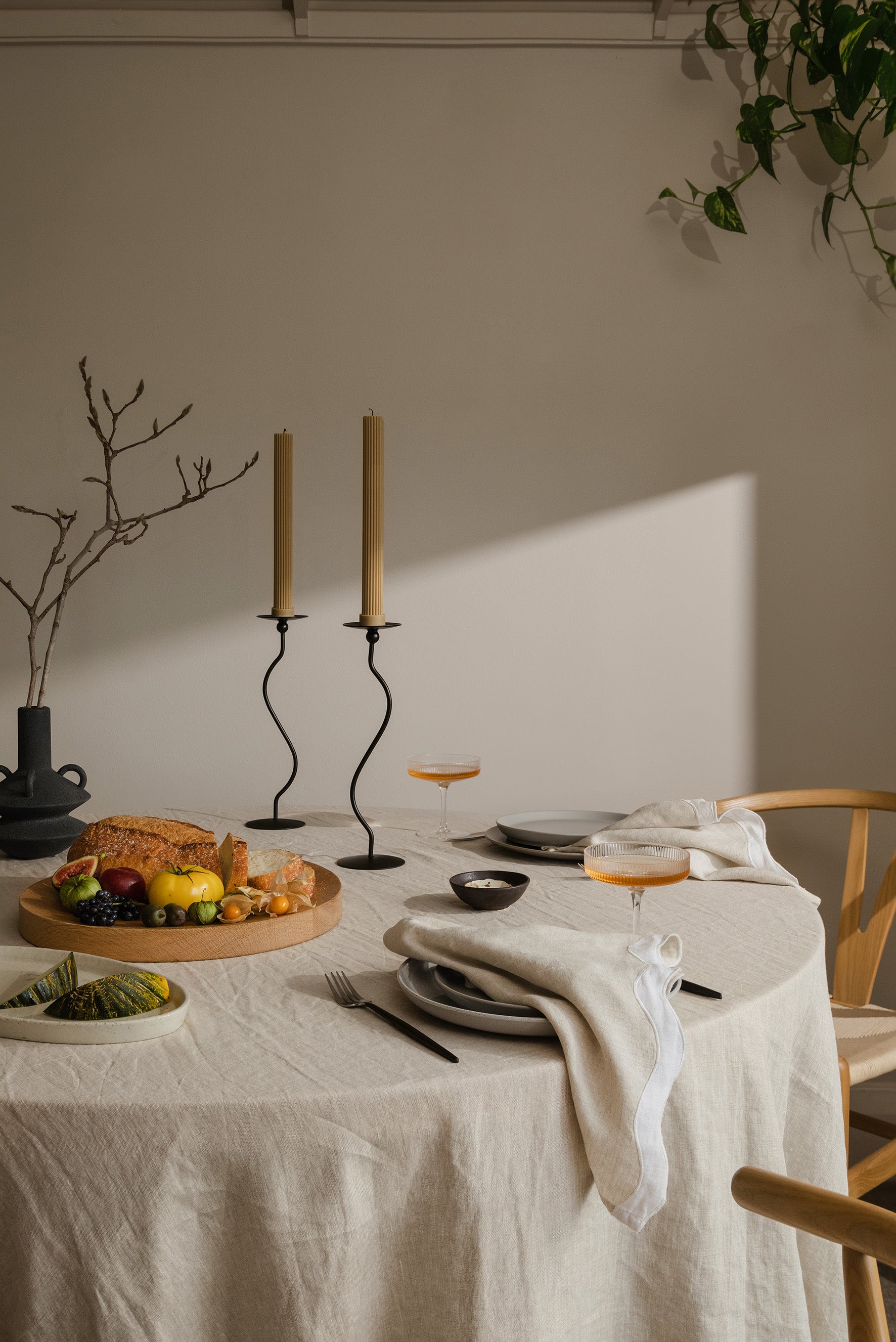 set table with food and napkins with sun shining through