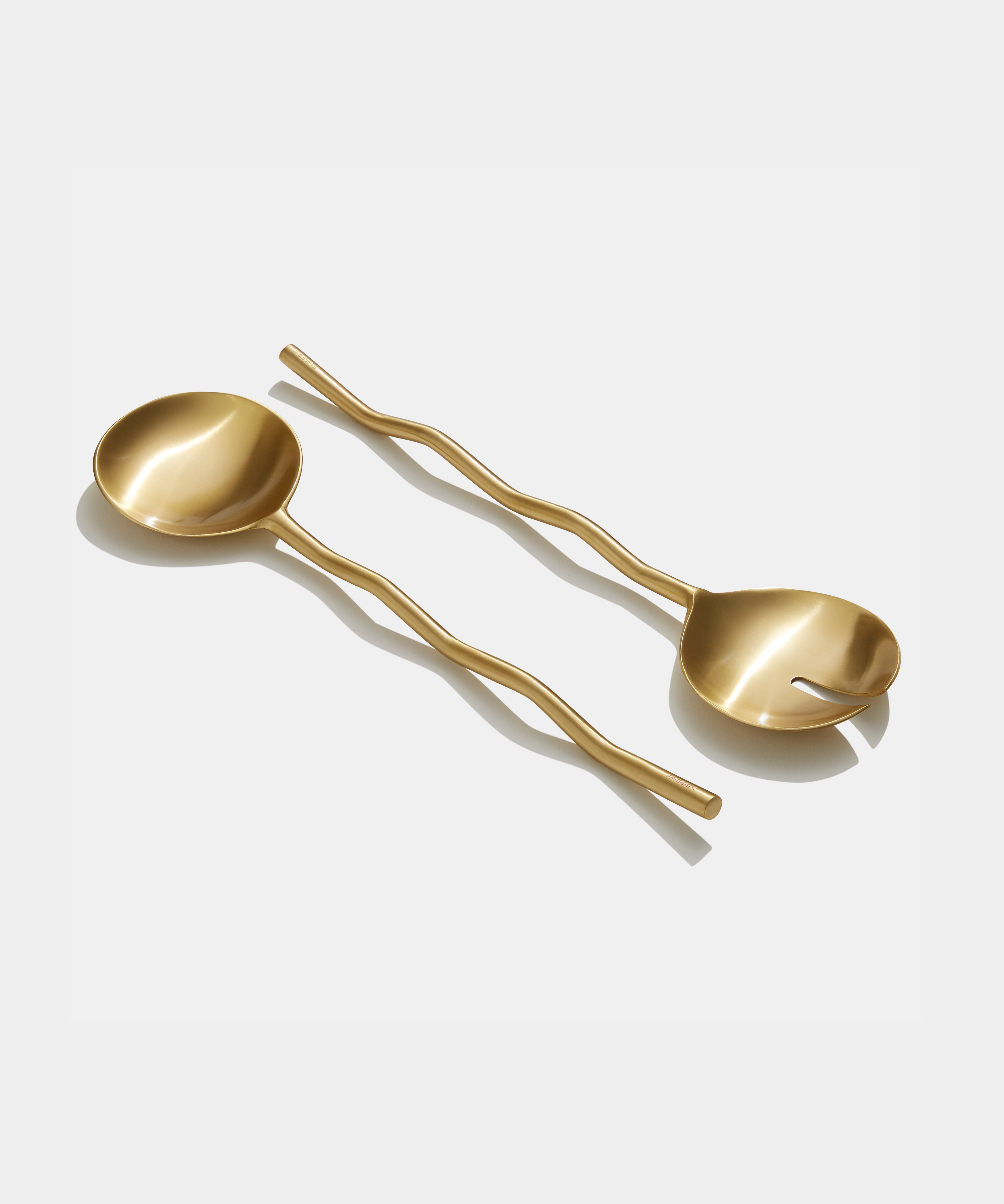 wave salad servers on white background