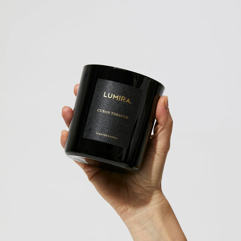 woman holding up candle