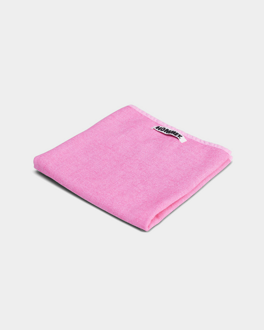 pink tea towel on white background