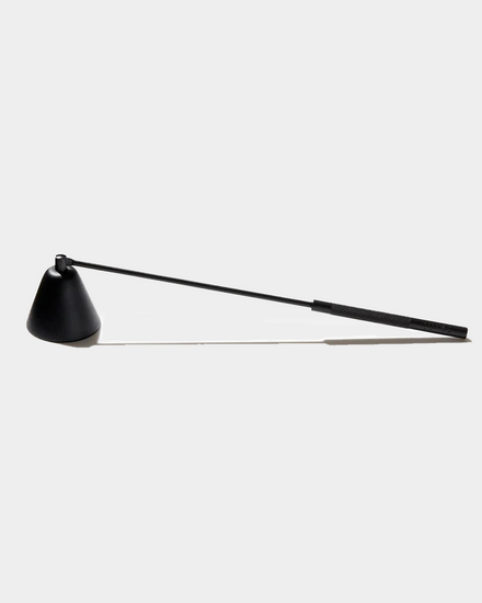 candle snuffer on white background