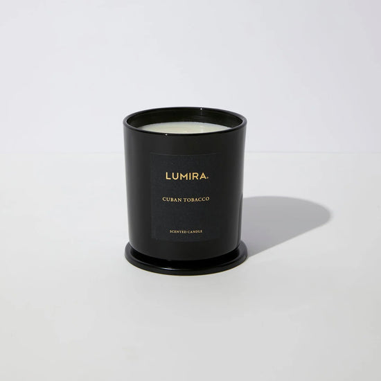 candle sitting on a white background