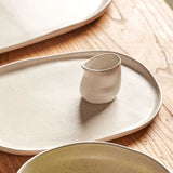 small white pouring jug on table 