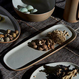 white speckled platter on table 