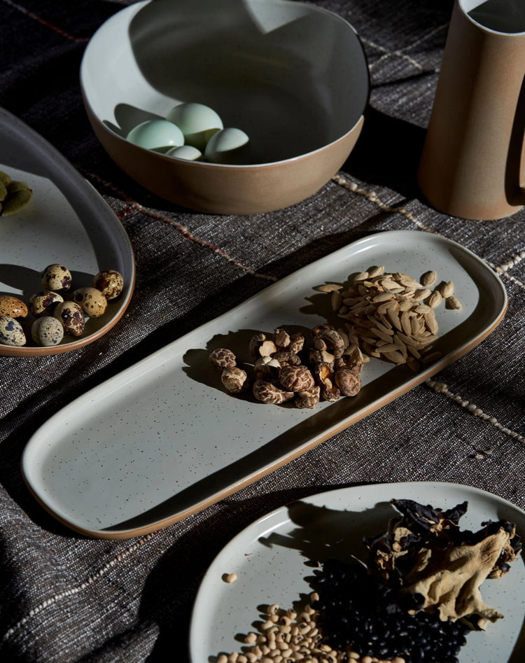 white speckled platter on table 