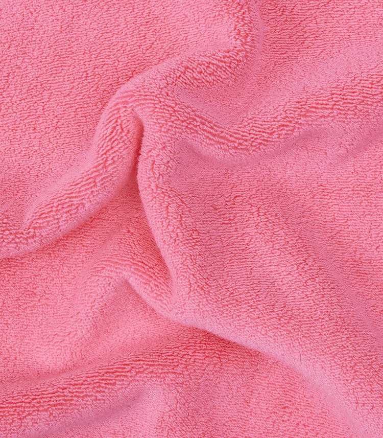 pink towel up close picture of texture 