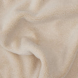 up close picture of texture of beige towel