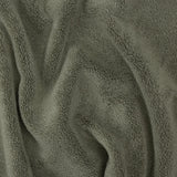 up close picture of dark green towel texture