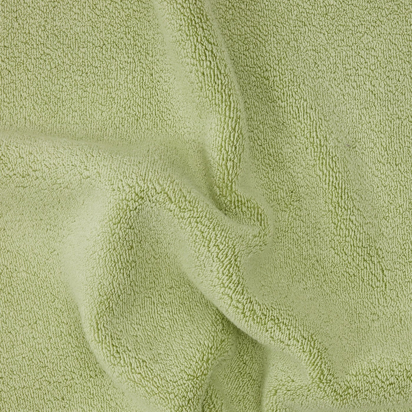 up close picture of texture of green towel