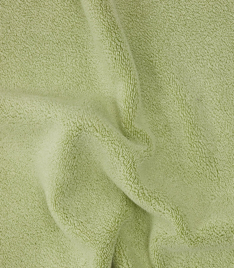 up close picture of texture of green towel